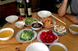 Lunch with our generous neighbor ShuShu. Pictured is a traditional Beijing dish 炸酱面 translated as "fried sauce noodles," complete with beer in bowls!